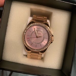 Rose gold juicy couture watch.